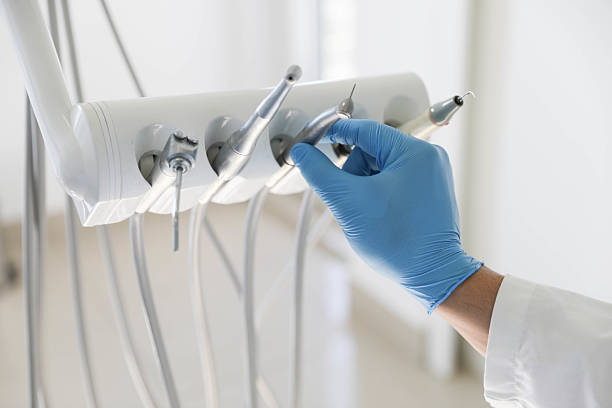 Professional Tooth Extraction technician working in Milford, IA